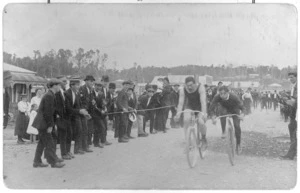 Bicycle race during the 1913 waterfront strike, McGowan Street, Runanga