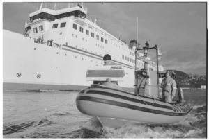 Wellington Sea Rescue Service craft beside the ferry Arahura - Photograph taken by John Reid