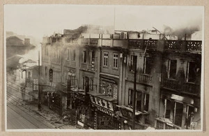 A burnt out city block, China