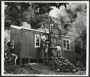 Tararua Tramping Club team working on the new Tauherenikau Hut - Photograph taken by Greg Royle