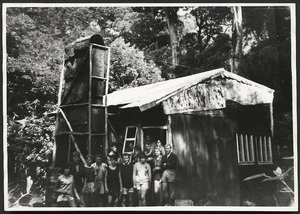 Tramping group outside Smith's Creek Hut, Tararua Range