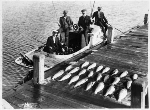 Group of anglers after a fishing trip on Lake Rotorua