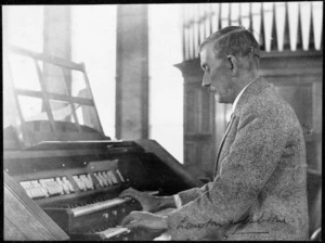 John Maughan Barnett at the console of the organ in the Whiteley Memorial Church, New Plymouth