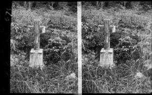 Headstone of an unkept grave, inscription on headstone is not readable, unidentified location