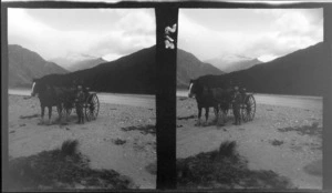 Edgar Williams' Mount Aspiring trip, three unidentified men with a horse drawn buggy in front of the West Matukituki River with snow covered mountains beyond, Central Otago Region
