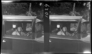 Alice Williams sitting in the drivers seat of the car, unknown location