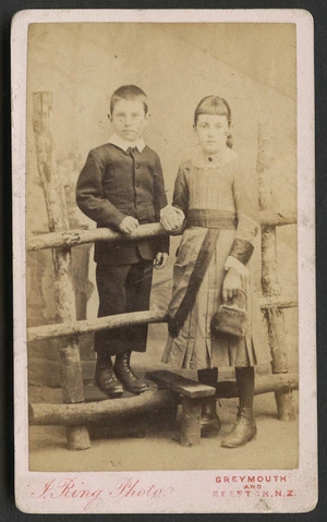 Ring, James (Greymouth and Reefton) fl 1879-1885 :Portrait of unidentified boy and girl