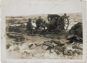 Creator unknown :Photograph of soldiers firing artillery gun during World War I