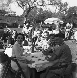 Group including World War 2 soldiers, and Lady Freyberg, at a British Embassy garden party in Cairo, Egypt