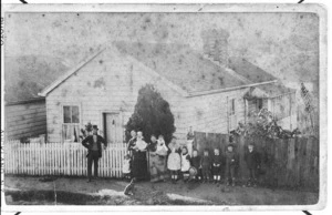 Bell family house at 7 Edwin Street, Auckland, with members of the Bell and Porter families