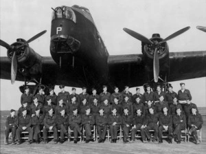 C Flight, No 75 (NZ) Squadron, Royal Air Force, in front of a Short Stirling bomber aeroplane