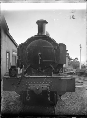 Closeup view of a the front of a We class steam locomotive.
