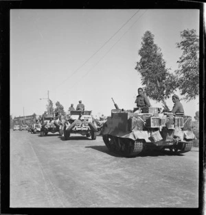 Maori Battalion, with anti-tank gunners and a Bren carrier, on an Italian Road leading into Tripoli, during World War 2 - Photograph taken by H Paton