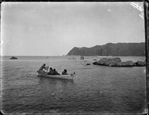 Waipiro Bay, Gisborne region, with Maori group in a fishing boat