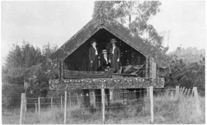 Unidentified women inside a Maori storehouse, Lake Papaitonga, Levin area