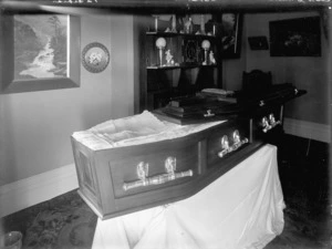 Open coffin with lace interior