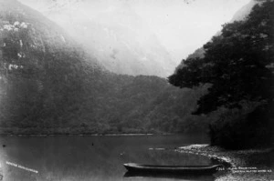 Lake Ada, Milford Sound, with a canoe