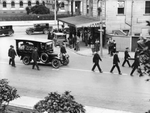 Raine, William Hall, 1892-1955 (Photographer) : Funeral procession with hearse, Bowen Street, Wellington