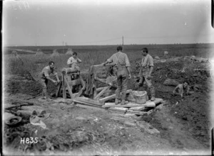 World War 1 soldiers constructing a dug-out in wheat fields at Bayencourt, France
