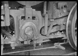 Closeup view of a locomotive's broken axle