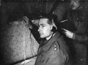 Prisoner of war using a hidden radio, Oflag 79, Braunschweig, Germany
