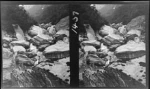 Mountain boulders with river running through, West Coast region