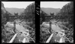 Group of unidentified schoolboys on [Banbury?] rail bridge, Denniston, Buller District, West Coast Region