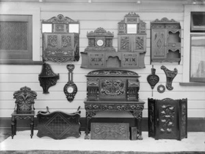 Photograph of items of carved wooden furniture
