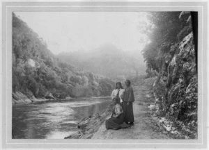 Group of Maori women on a road alongside the Whanganui River