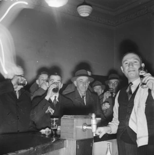 Men at a bar on VJ day