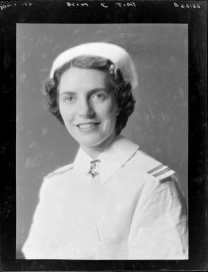 Registered nurse in uniform, probably Miss D Tait