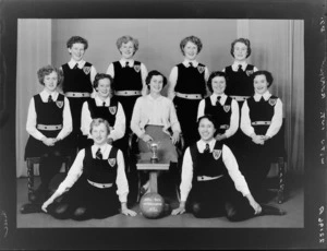 Wellington 1954 girls' intermediate basketball representative team, with cup