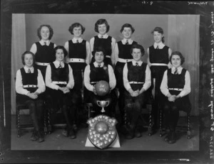 St Mary's College Old Girls 3A basketball team, with trophies, 1954