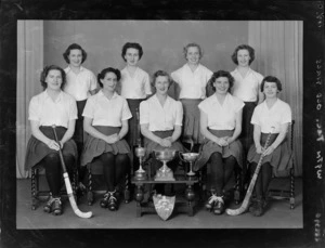 Wellington Technical College old girls hockey team with trophies