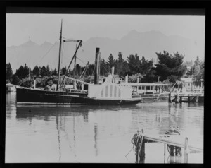 Passenger steam boat, berthed next to other passenger boats, [Queenstown-Lakes District]