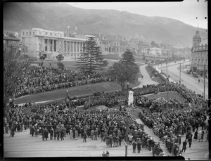 Wellington, 1928 Anzac Day parade of armed forces at the Cenotaph, with Parliament beyond