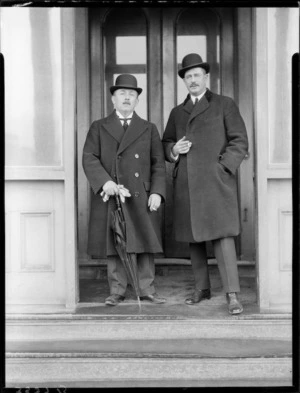 Prime Minister Rt Hon J G Coates with unidentified man