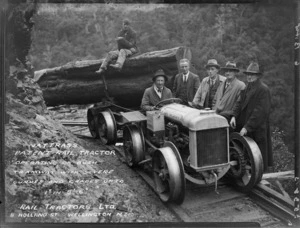 Unidentified men with Fordson Nattrass Rail Tractor pulling log, Campbells Mill, Akatarawa