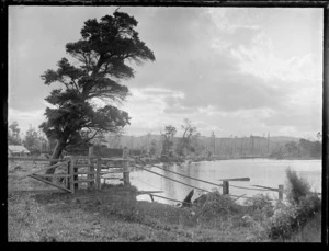 [Owaka River?], Catlins district, including a house to the left and hills beyond