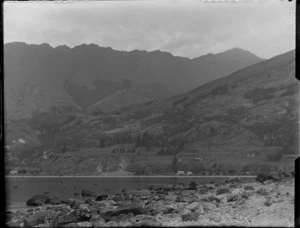 Lake Wakatipu, including a few houses, hills and mountains, Queenstown-Lakes District
