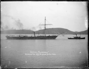 Sailing ship Samuel Plimsoll, dismasted, being towed in Otago Harbour