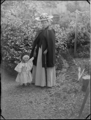 Portrait of Lydia Williams with son Owen or Edgar in the garden of their home at Royal Terrace in the suburb of Kew, Dunedin City