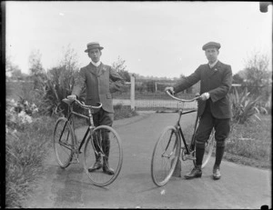 Edgar and Owen Williams with bicycles on the driveway of [the family summer residence of Riverside Cottage, Pounawea, South Dunedin, Otago Region?]