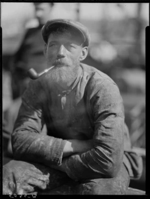 Unidentified man [from a ?] whale boat, Pipitea wharf, Wellington