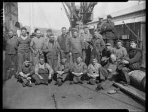 Unidentified men [from a ?] whale boat, Pipitea wharf, Wellington