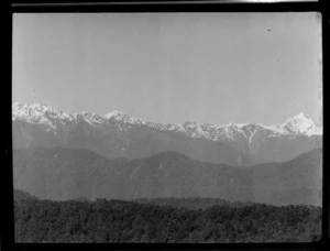 View of forest covered hills to mountain ranges, Westland