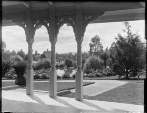 View from porch of Tea Kiosk house, looking towards ornamental pond, Sanatorium grounds, Rotorua Government Gardens, Bay of Plenty region