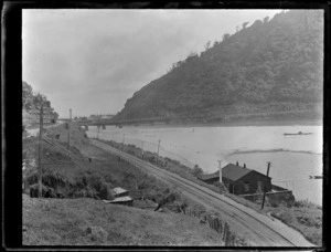 Omoto Road and railway line alongside the Grey River with wooden Cobden Railway bridge across river, near Greymouth
