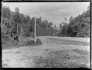 Telephone poles by river valley, Buller/Nelson District