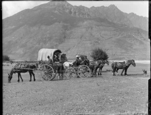 People traveling, crossing river on horse and cart, unidentified location